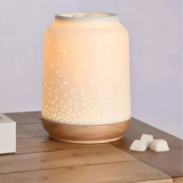 White ceramic Loire wax melt and oil electric burner with fairy lights, by Widdop & Co, featuring a decorative and functional design.