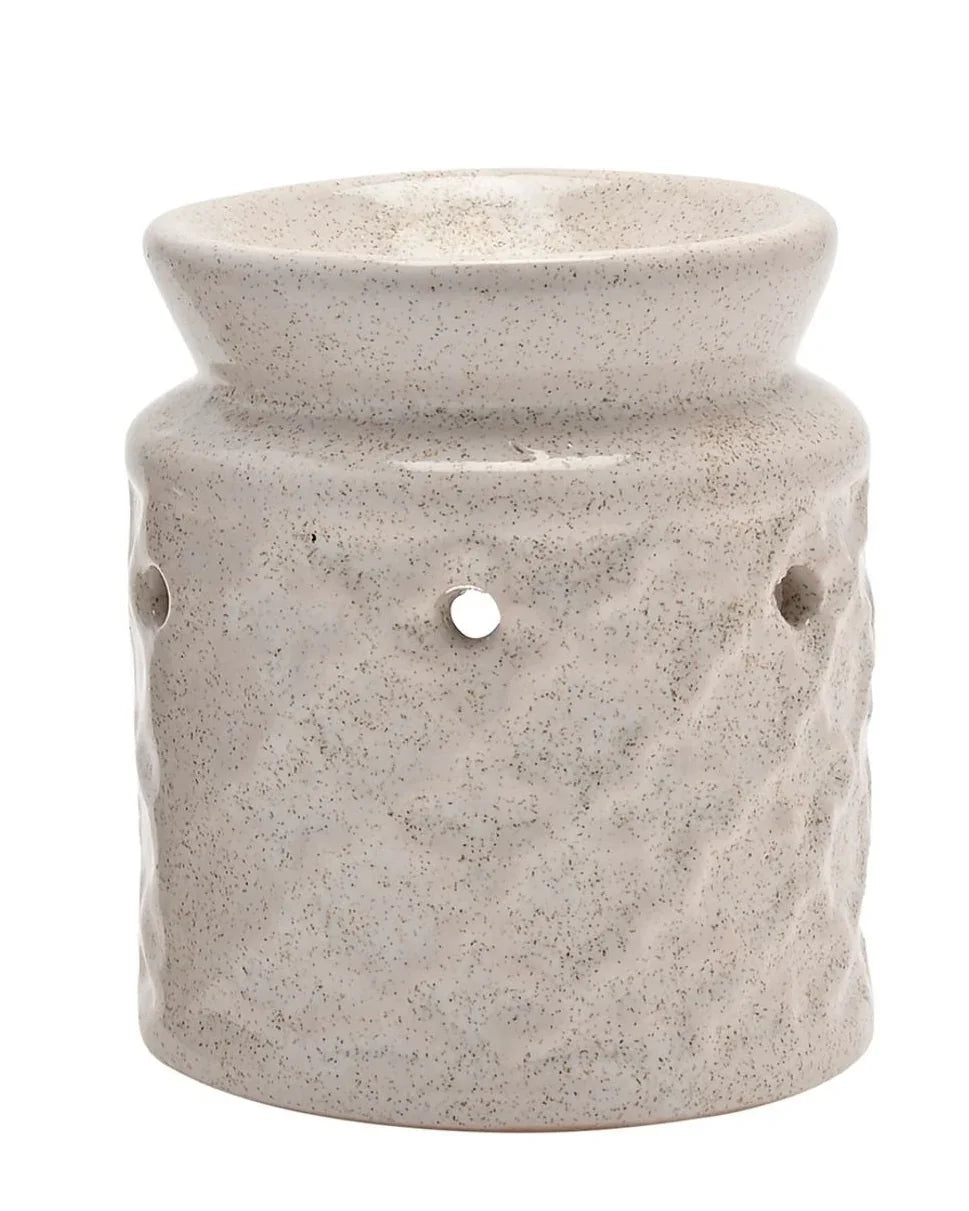 White mini ceramic wax melt burner from Widdop & Co, designed for melting scented wax melts in a compact, decorative home accessory.