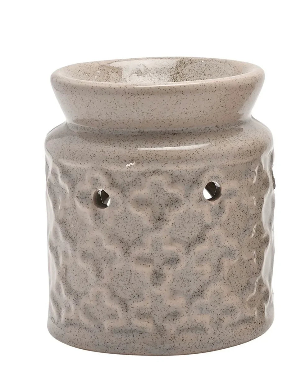 White mini ceramic wax melt burner from Widdop & Co designed for melting wax melts and enhancing home fragrance.