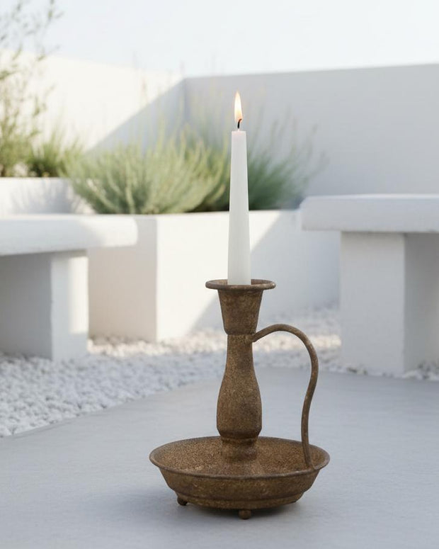 Rustic brass dinner candle holder from Wikholmform, ideal for home decor, featuring a classic design with a sturdy base.