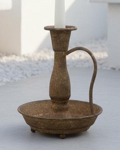 Brass rustic dinner candle holder by Wikholmform, elegant home decor piece with a vintage, textured finish for tabletop display.