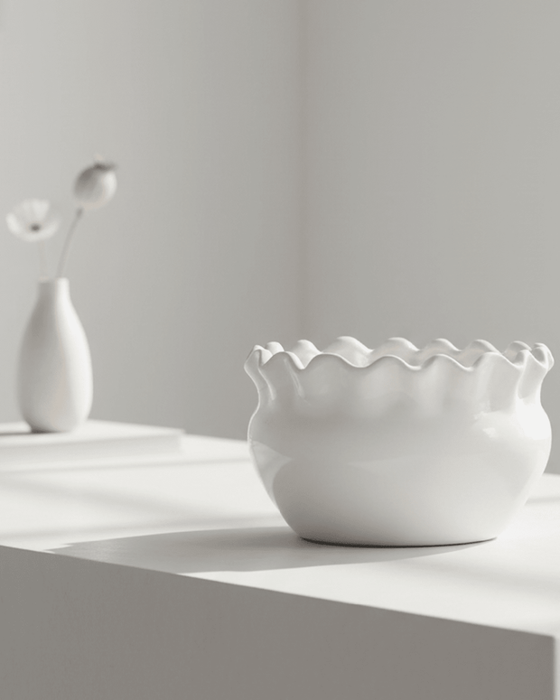 White ceramic bowl from Wikholmform Evelina home décor collection, with a sleek, minimalist design for stylish interior accents.