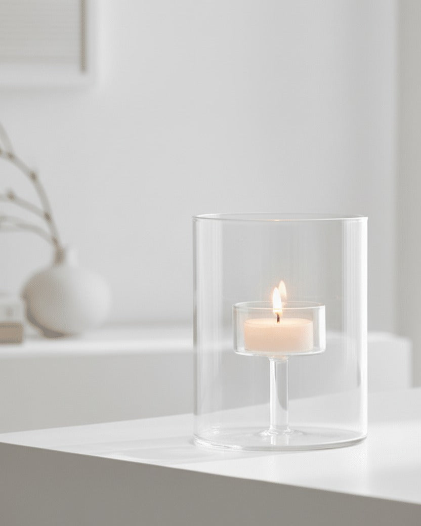Glass tealight candle lantern by Wikholmform, decorative home décor piece with a clear glass design for ambient lighting.