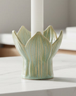 Green Tulip Ceramic Candle Holder by Wikholmform, a stylish home decor piece with a tulip design and smooth ceramic finish.