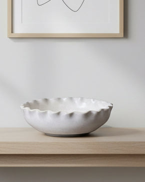 White ceramic bowl by Wikholmform, elegant home décor piece with smooth finish and minimalist design.