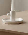 White ceramic candlestick holder by Wikholmform, elegant home decor accessory with a smooth finish and classic design.