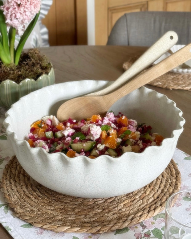 White ceramic scalloped serving bowl by Wikholmform, perfect for home décor and elegant table presentation.