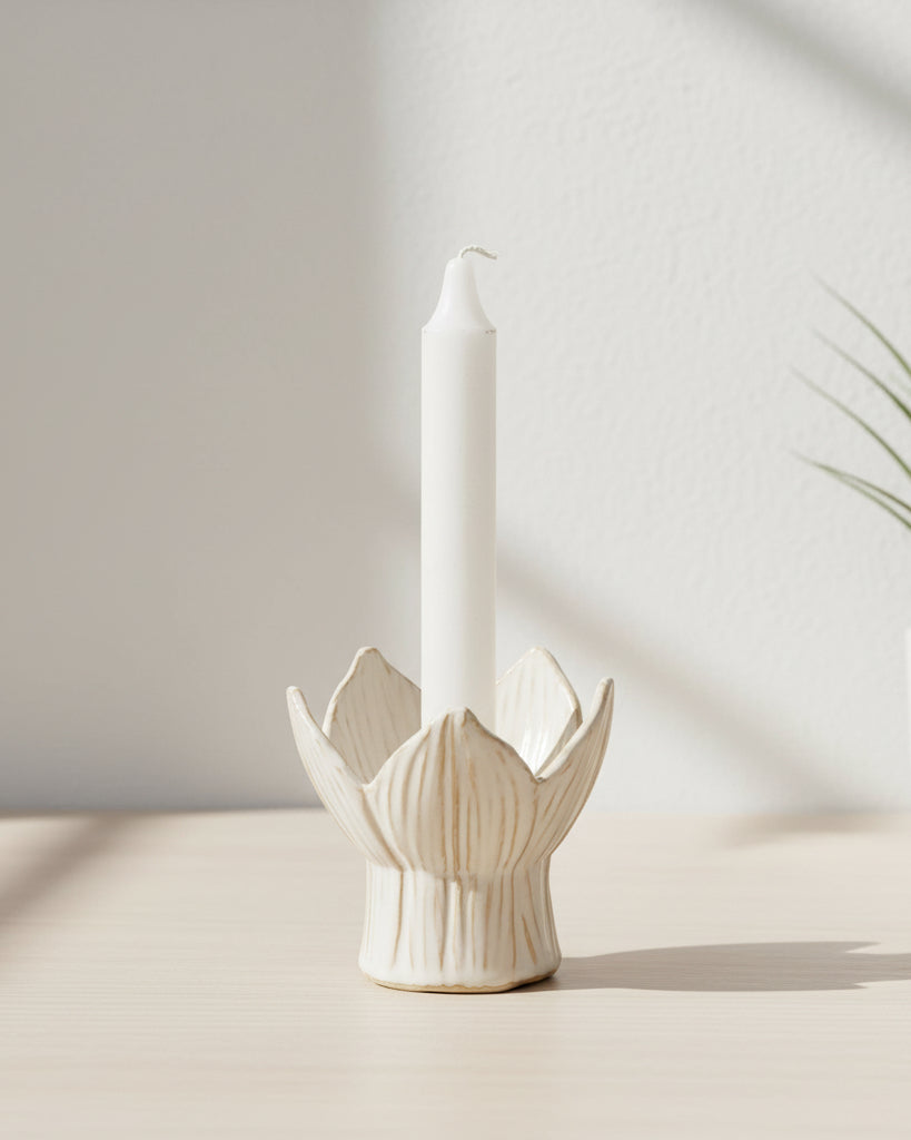 White Tulip ceramic candle holder by Wikholmform, elegant home decor piece with a tulip shape and smooth ceramic finish.