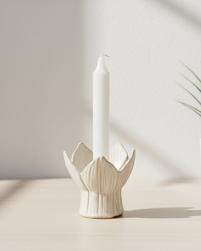 White Tulip ceramic candle holder by Wikholmform, elegant home decor piece with a tulip shape and smooth ceramic finish.