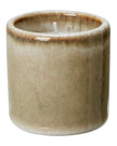 Small neutral candle pot by Wikholmform, a stylish home decor accessory with a simple, elegant design and natural finish.