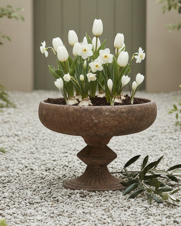 Large rusty metal footed bowl for outdoor decor by Wikholmform, with a weathered, rustic finish suitable for garden or patio display.