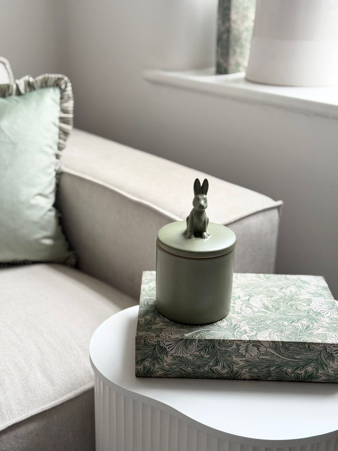 Olive green rabbit-shaped storage jar with lid, spring-themed design by Wikholmform, ideal for kitchen organization.