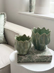 Small green ceramic Leslie Tulip Pot by Wikholmform, perfect for spring floral displays and decorative plant arrangements.