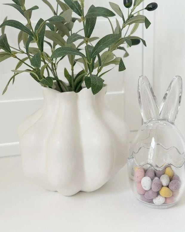 White Poppy Seed Head Vase by Wikholmform, showing a stylish ceramic vase with intricate seed head design and a glossy white finish.