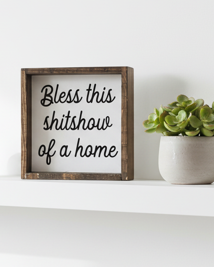 Small white framed sign with "Bless This Shitshow" in black text, a home decor piece by Williamraedesigns.