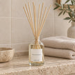 Winter Scent Medium Reed Diffuser by Heaven Scent Incense Ltd in a styled room with glass bottle and reed sticks for fresh winter aroma.