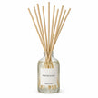 White Winter Scent Medium Reed Diffuser by Heaven Scent Incense Ltd with elegant reeds in a modern studio setting.