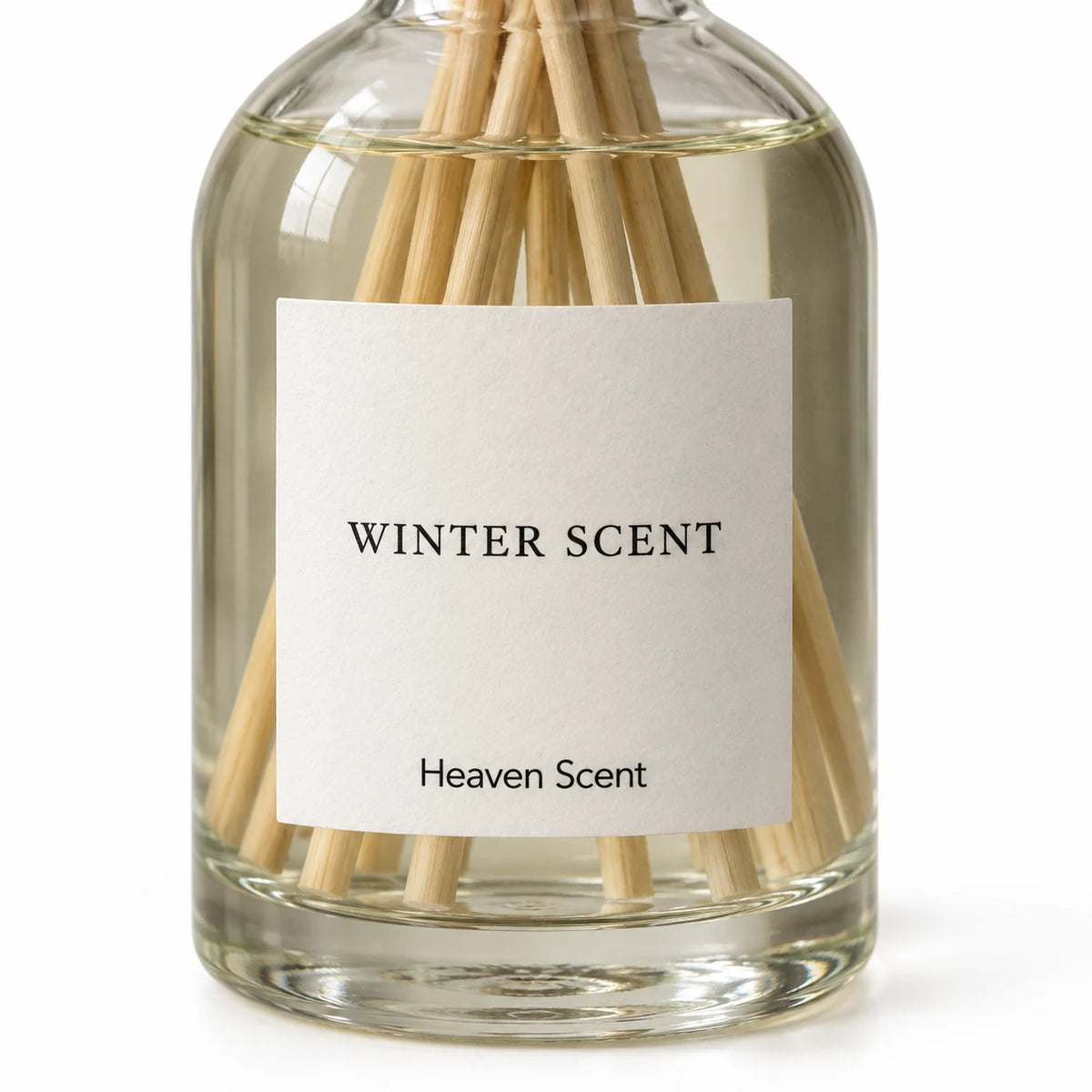 Close-up of Winter Scent Medium Reed Diffuser label showing brand Heaven Scent Incense Ltd and product details.