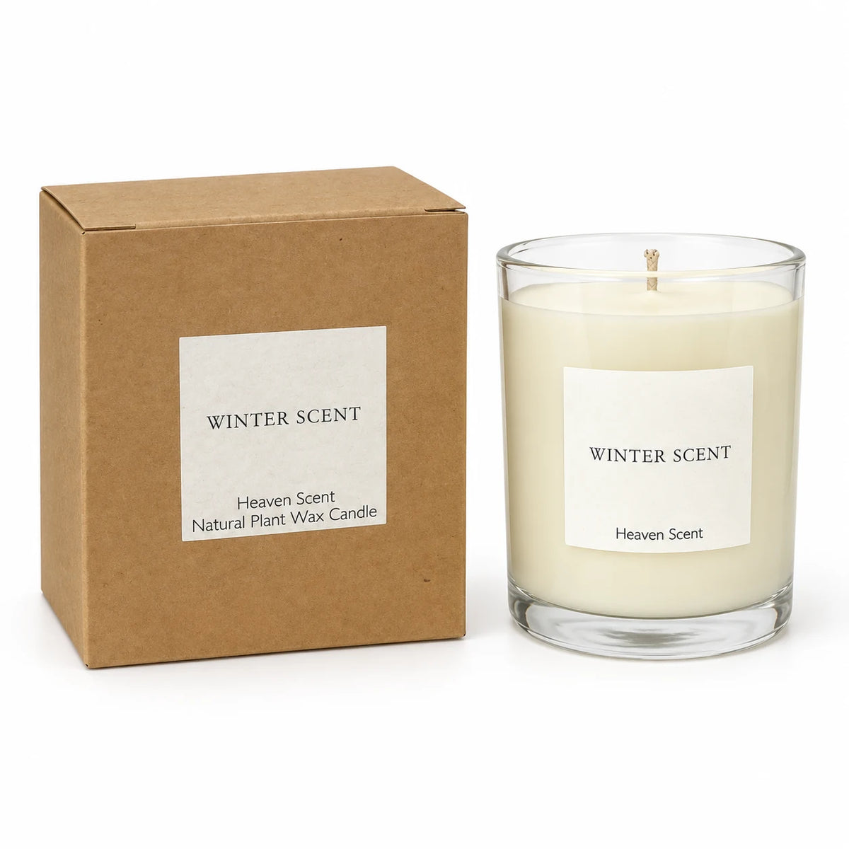 Heaven Scent Winter Scent Medium Candle, unlit with its brown kraft box against white