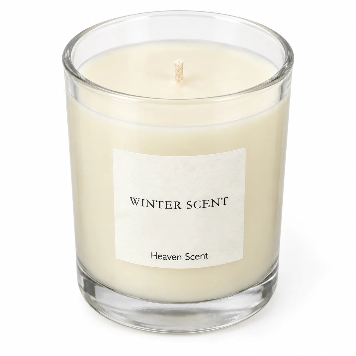 Heaven Scent Winter Scent Medium Candle, close-up of cream wax and the unlit wick