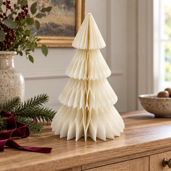Winter White Paper Christmas Tree on an oak sideboard with festive greenery and burgundy ribbon