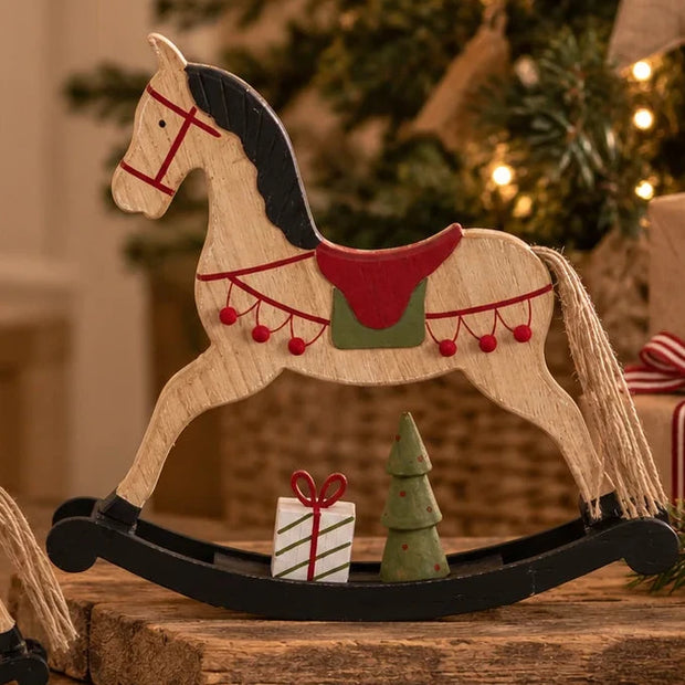 Wooden rustic rocking horse decorated for Christmas, featuring natural wood finish and festive holiday details.