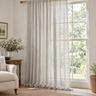Yard greige sheer voile curtain panel styled in a bright country living room