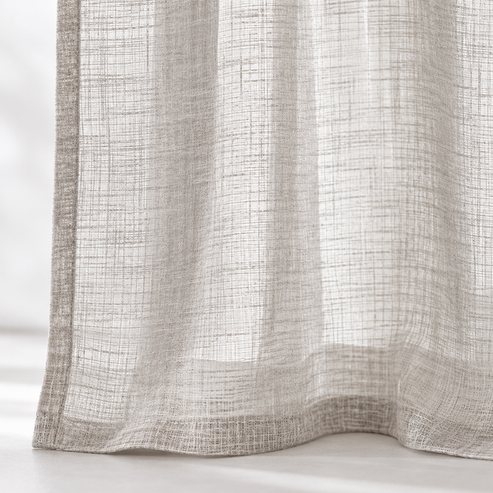 Yard greige sheer voile curtain panel close-up of the fabric hem and edge