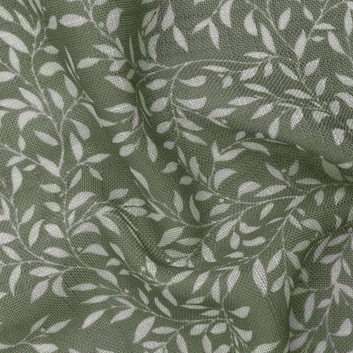 Green woven sheer voile curtain panel with yard leaf pattern from Riva Home, soft furnishings, 140cm wide by 250cm long.
