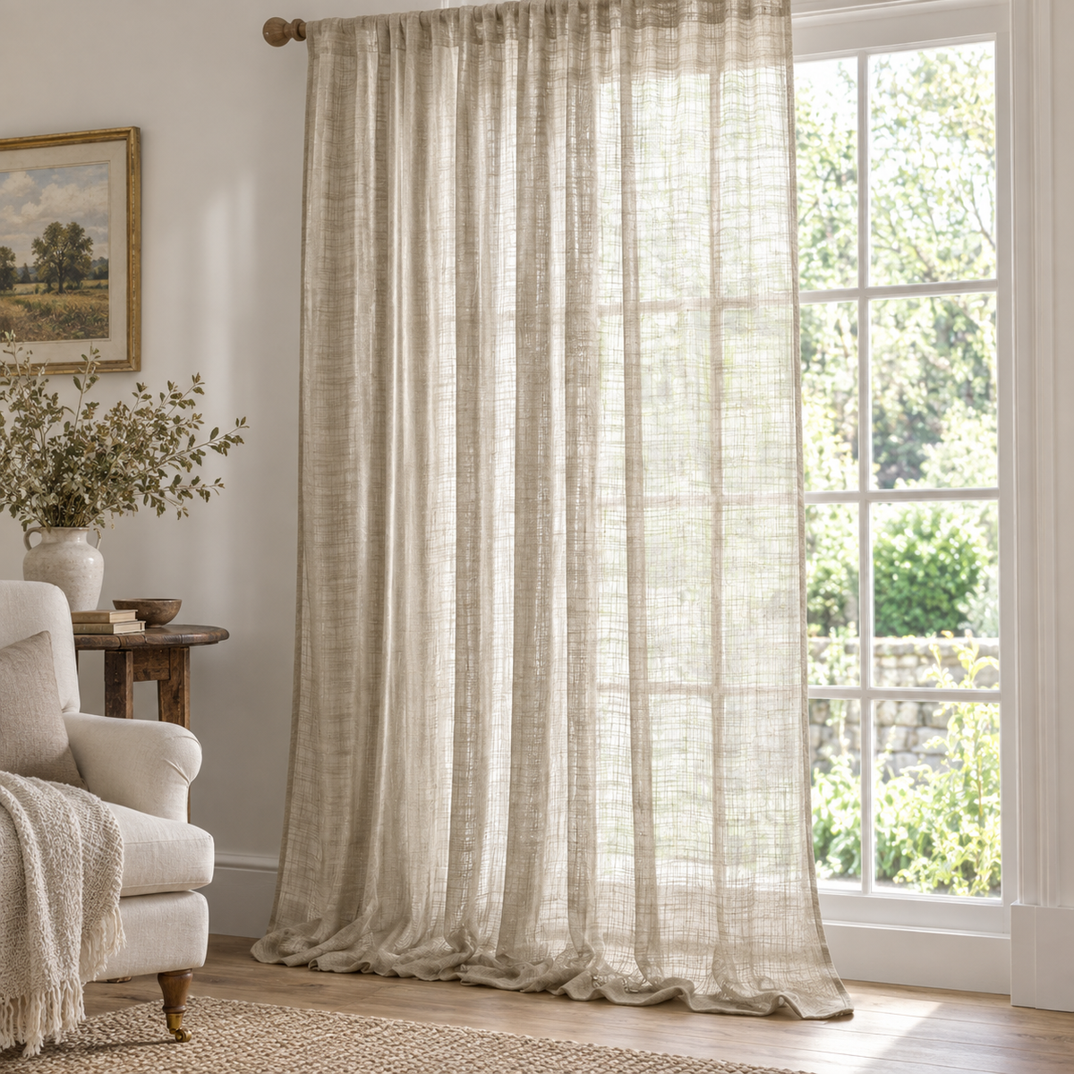 Yard natural beige sheer voile curtain panel styled in a bright country living room