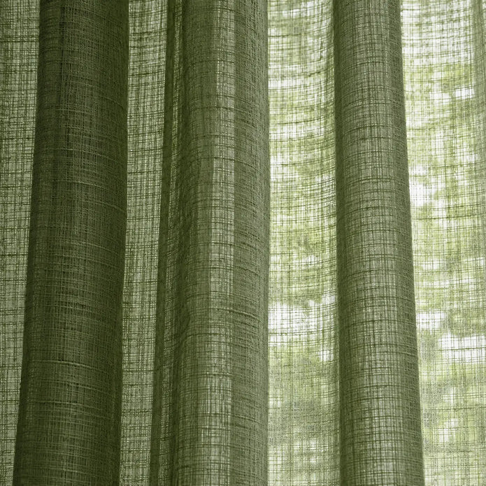Olive green woven sheer voile curtain panel with hanging folds, soft furnishings by Riva Home.