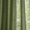 Olive green woven sheer voile curtain panel with hanging folds, soft furnishings by Riva Home.