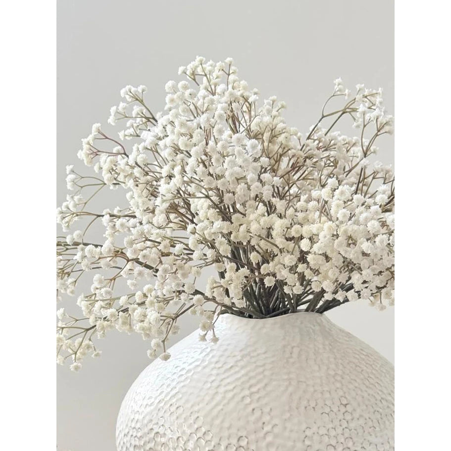 Zaffera Ivory Caldron Textured Vase, close-up of white branches in an ivory textured vase